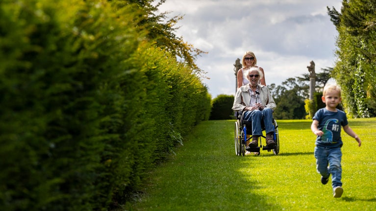 Visitors on the Long Walk at Polesden Lacey, Surrey